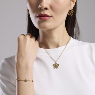851028

Girocollo in acciaio dorato con fiore
Style 17