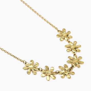 Style 16
851037

Girocollo dorato con fiori effetto martellato
Style 16
