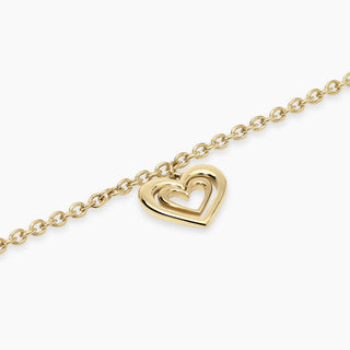 831080

Bracciale dorato con ciondolo cuore
Style 27