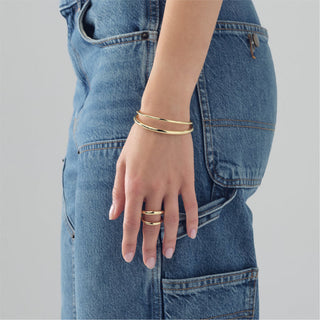 Bracciale rigido aperto da donna Unoaerre in bronzo dorato (cod.art.2632)